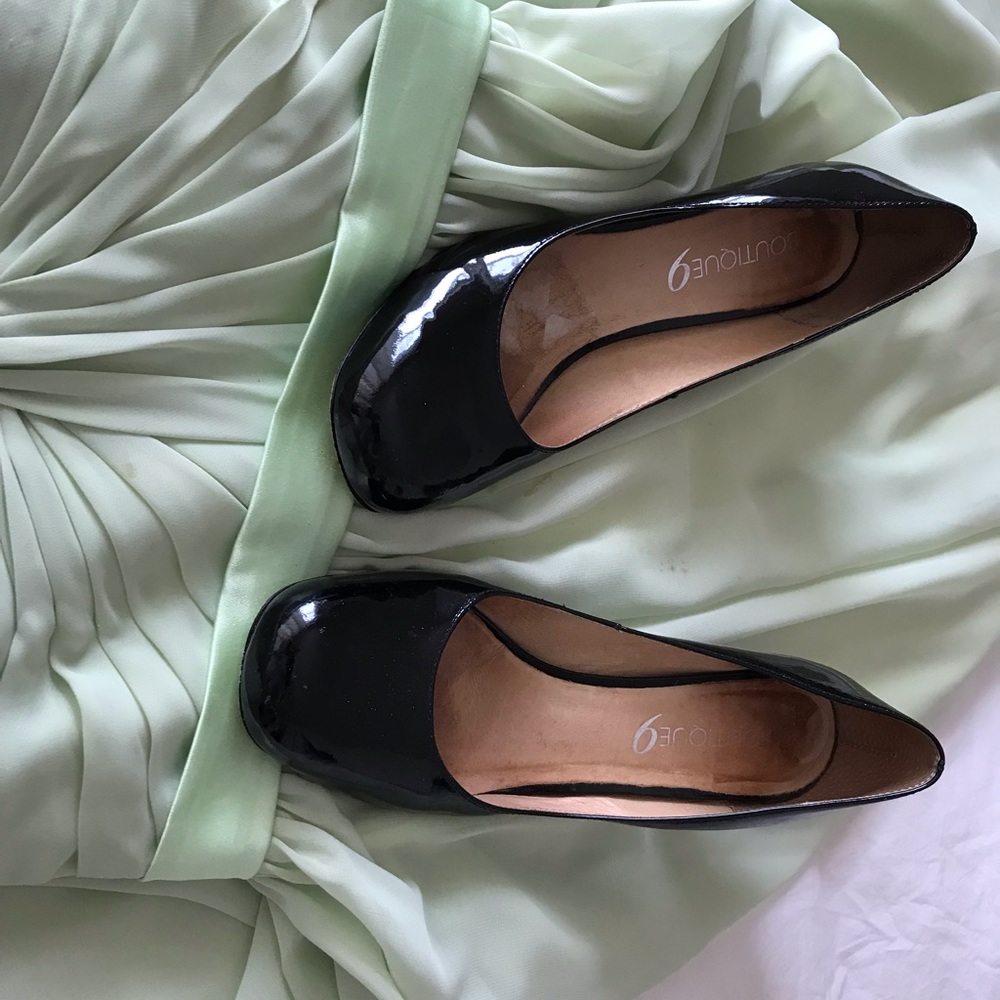 Boutique 9,used black patent leather pumps heel 3 1/4 inch heel .